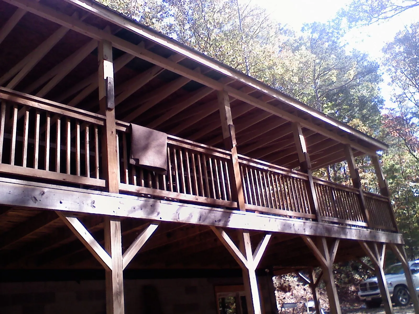 Timber framing under a new elevated porch and deck — Roof Leak Repair in Boulder by Roofing Brothers